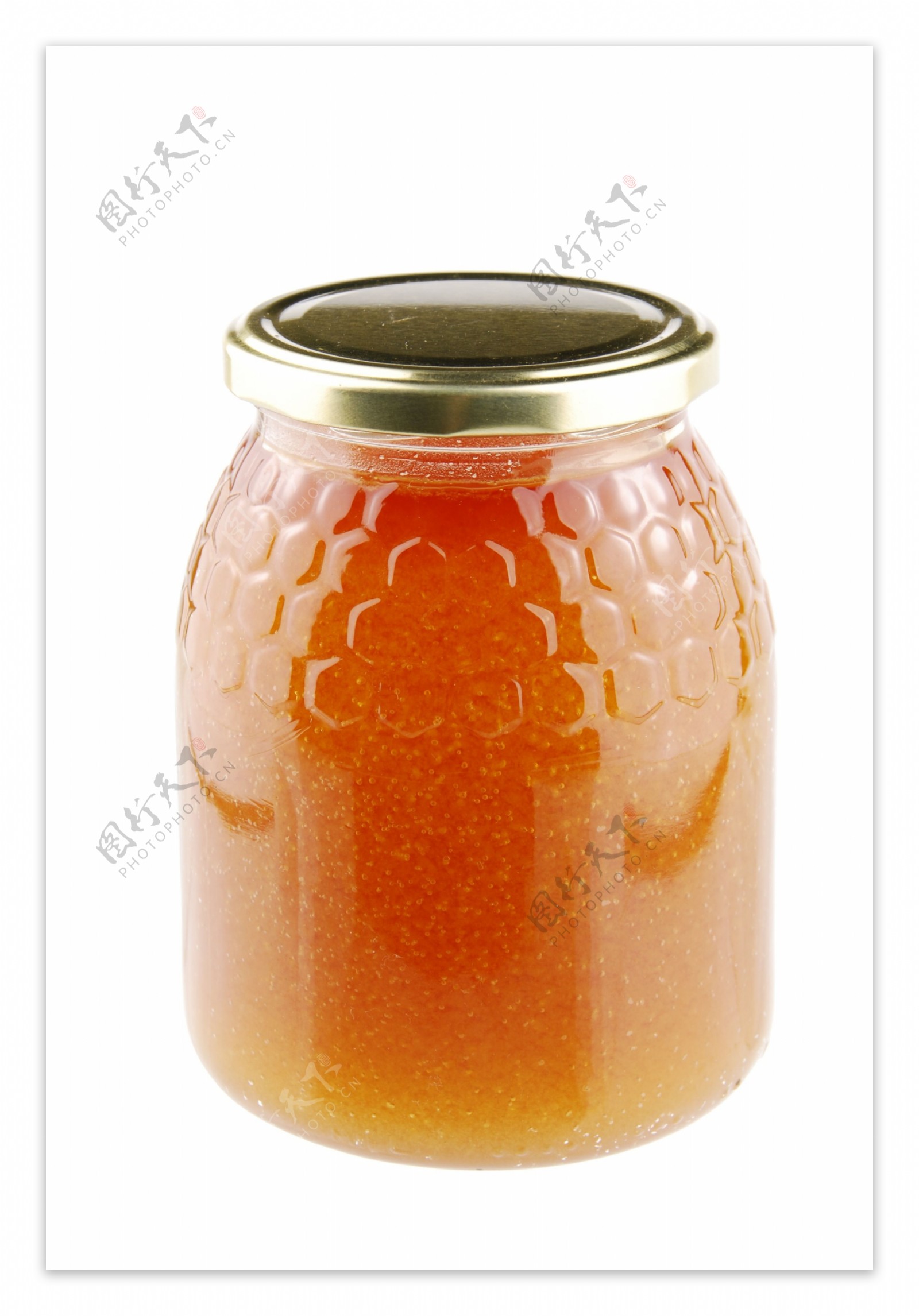自制蜂蜜在白色的玻璃瓶