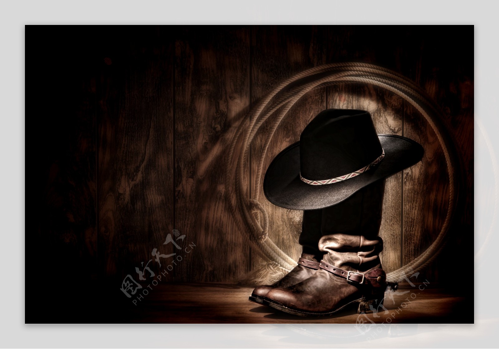 牛仔帽子与皮靴图片