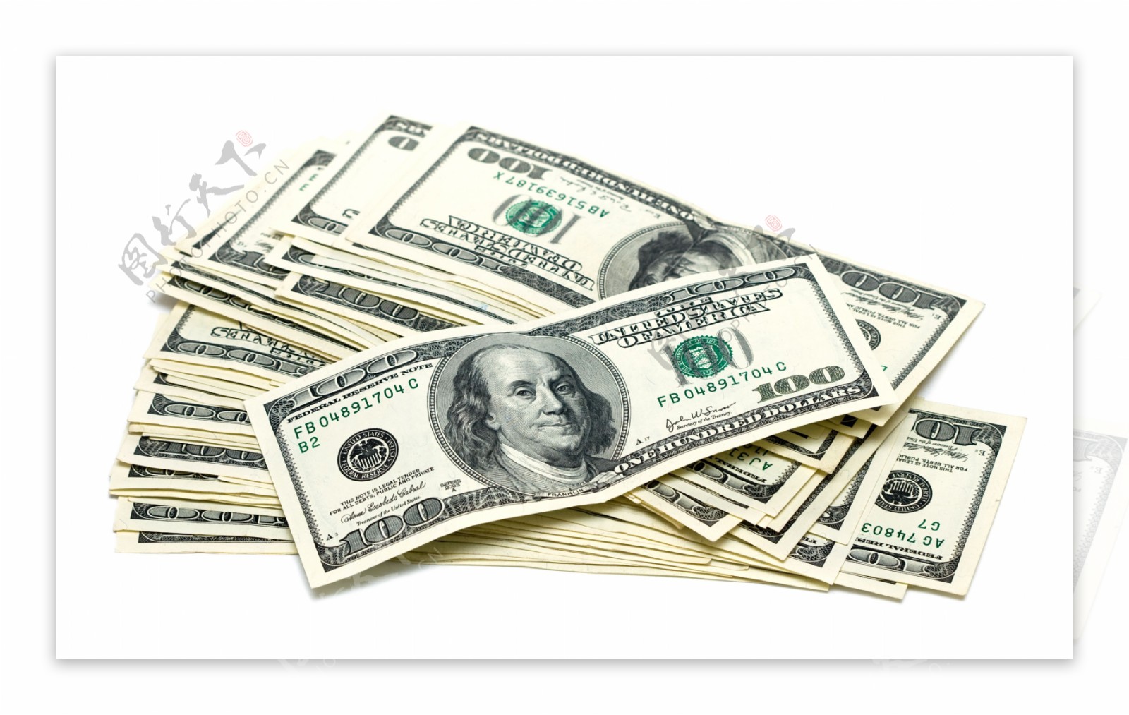 一叠散放的美元钞票创意设计图片