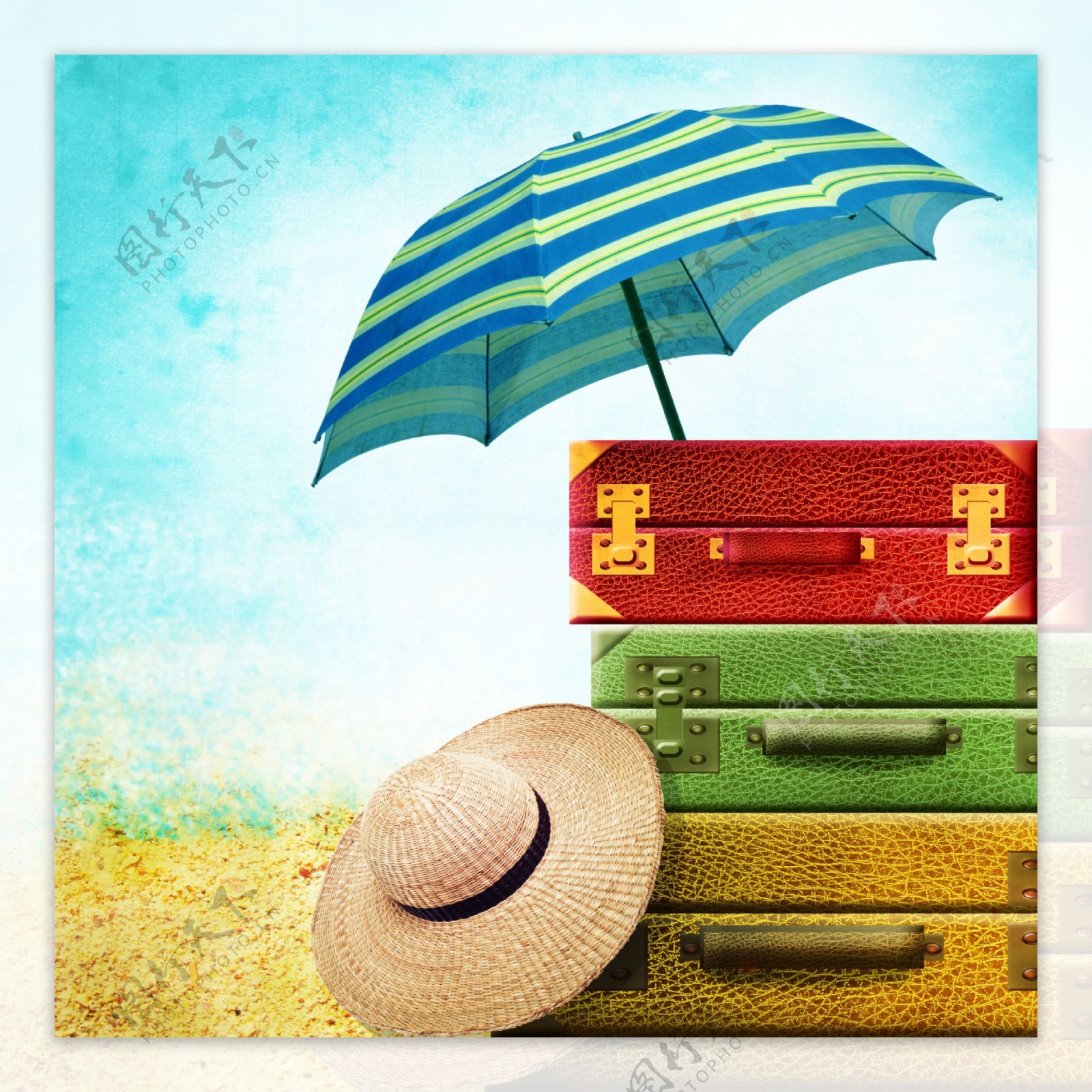 太阳伞与旅行箱草帽图片