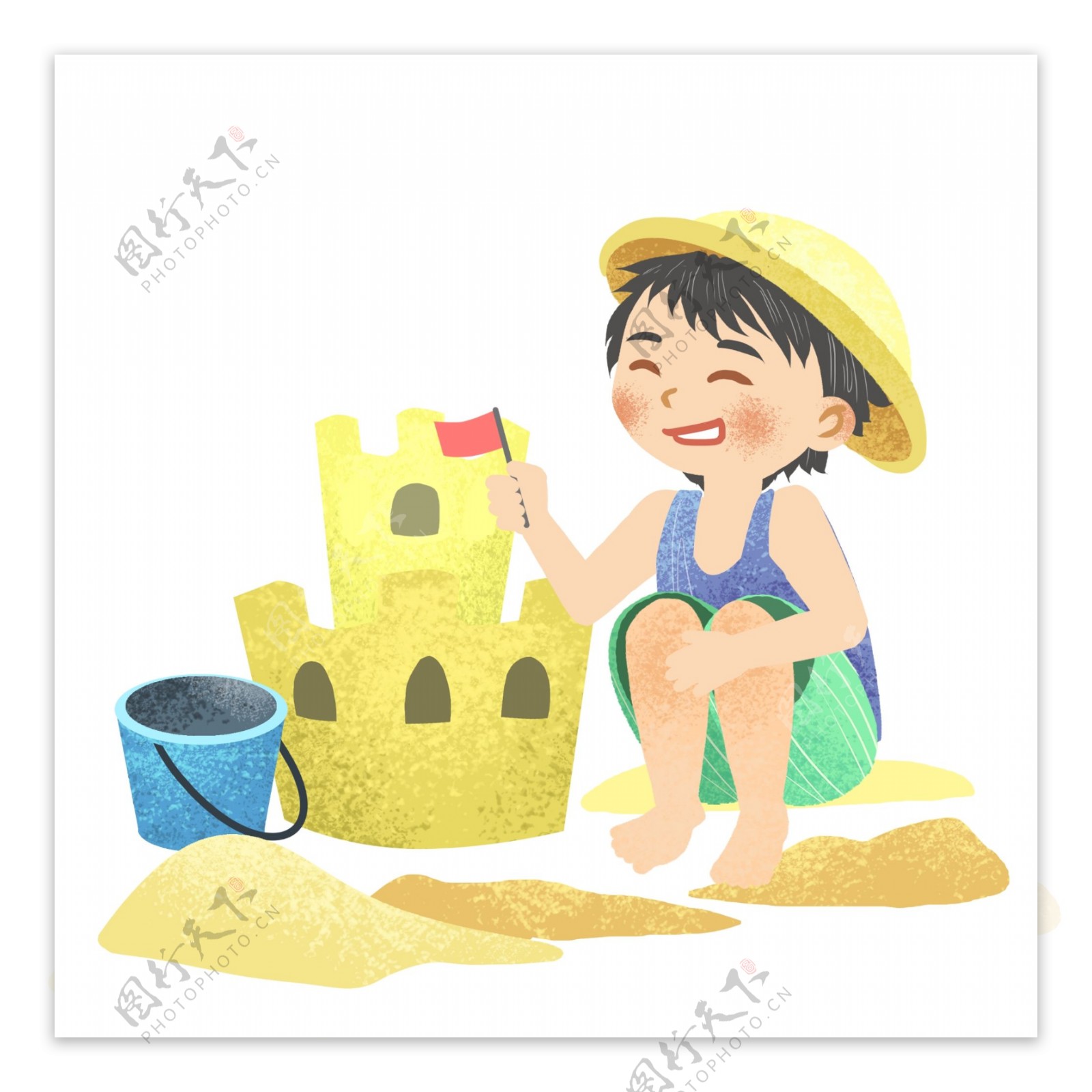小男孩在沙滩堆城堡